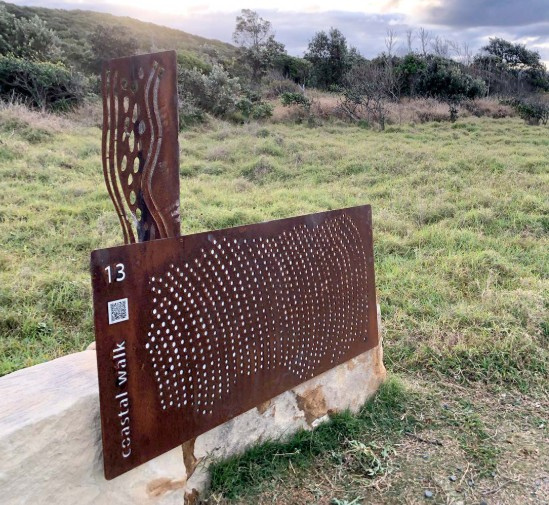 Corten coastal walk sign
