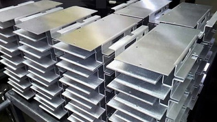Stacked bent aluminium parts